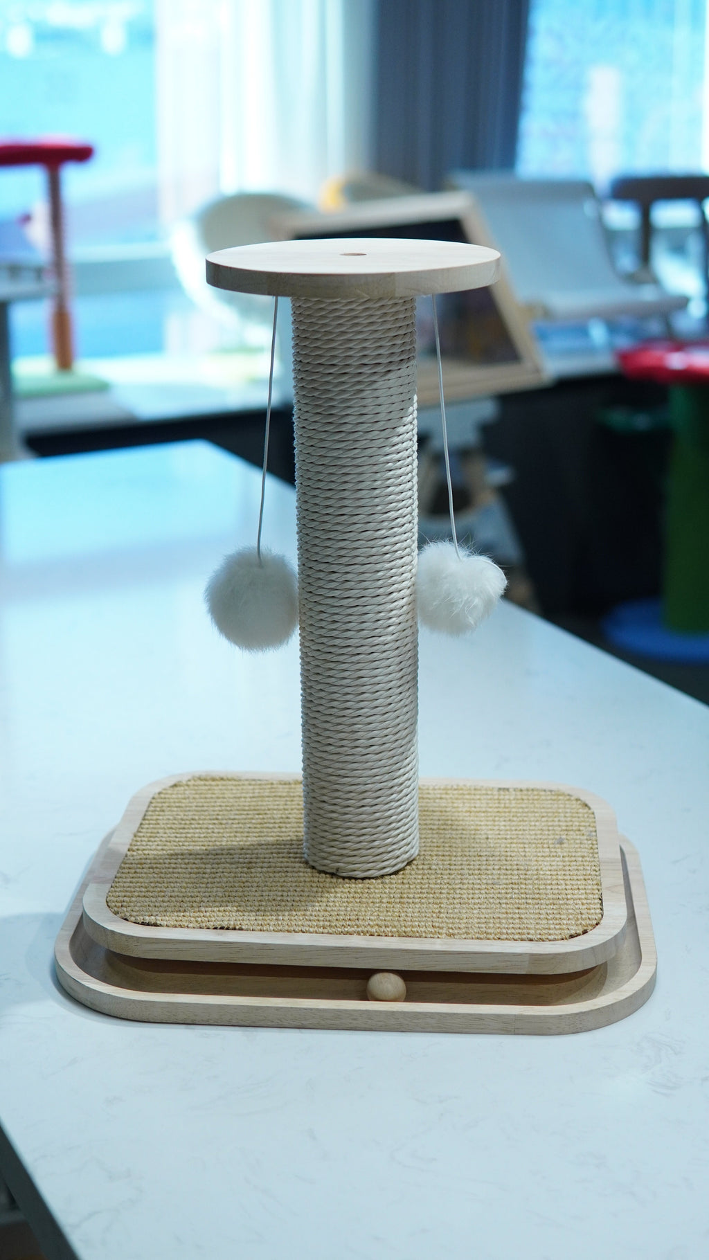 Spool & Play Cat Scratcher - front view with pom-poms