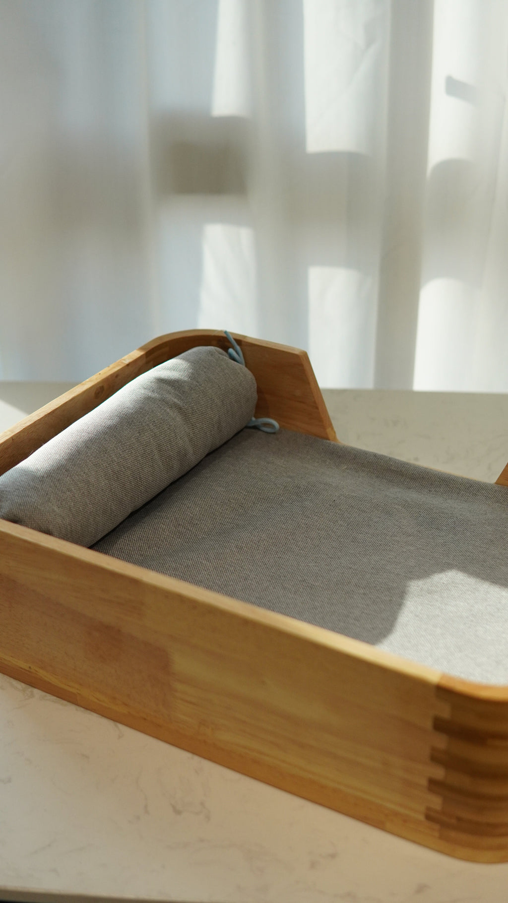 Bamboo Pet Bed - angled view showing finger-joint corners